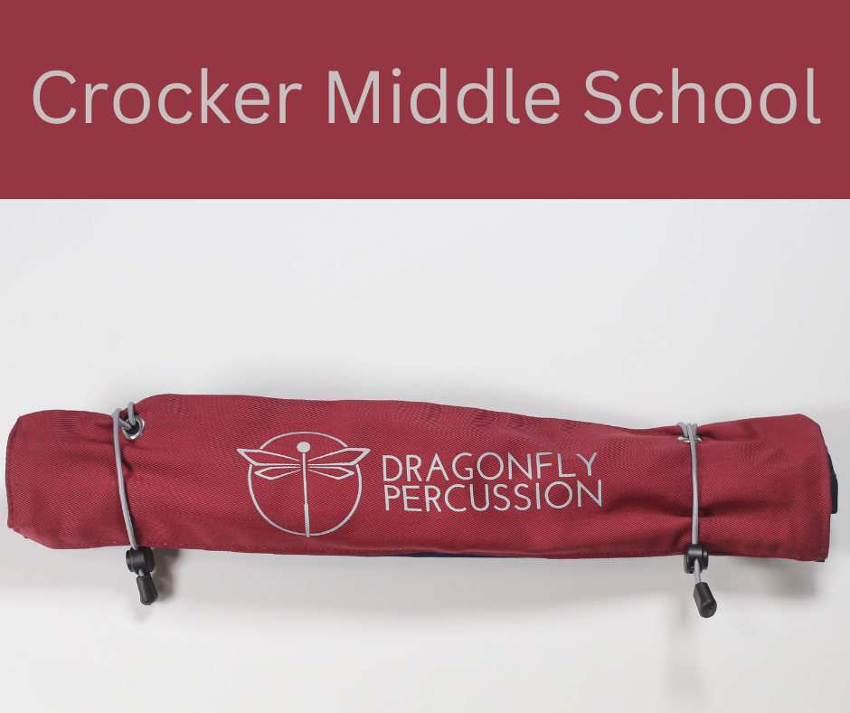 Red rolled up stick case with the Dragonfly logo.  Text above the bag says "Crocker Middle School"