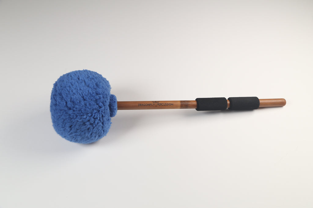 Large blue sherpa mallet head on a bamboo handle with two small foam grips.