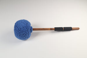 Large blue sherpa mallet head on a bamboo handle with two small foam grips.