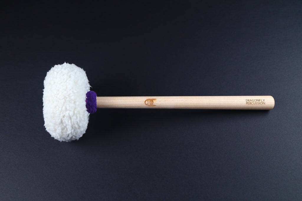Mike Tamburo Large Mallet.  Wooden handle with large head covered in white sherpa.