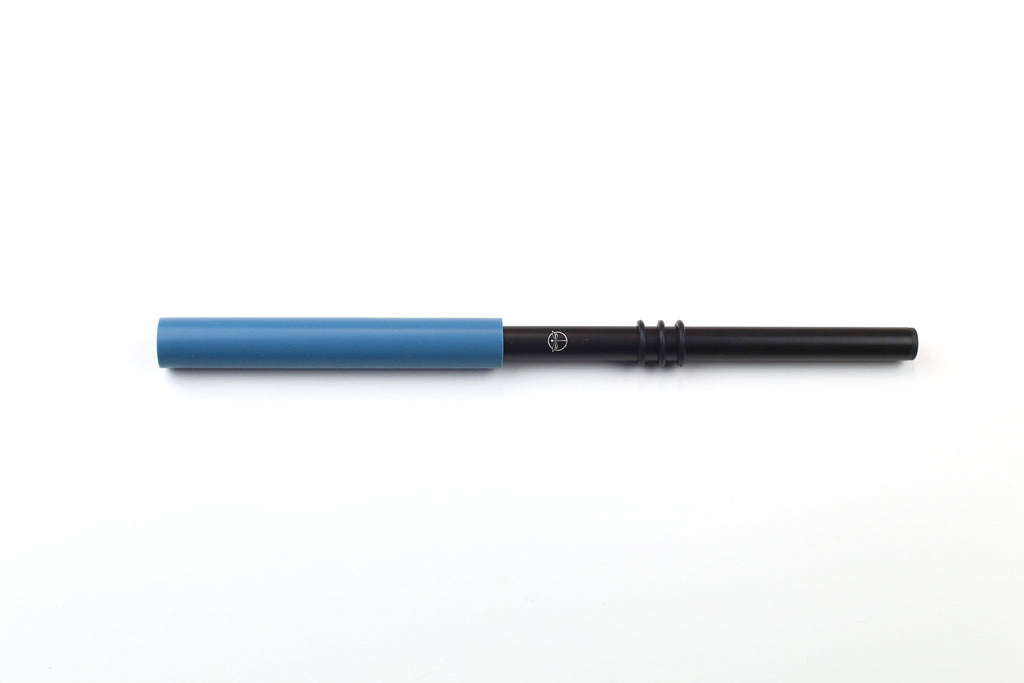 Small silicone wand - blue silicone tube at the end of a black aluminum tube.