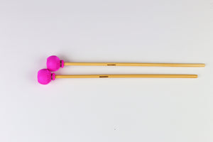 Soft Solo Xylophone mallets on rattan handles.  Pink spandex wrapped heads.