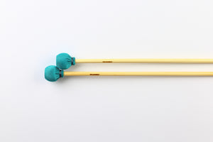 Medium vibraphone mallets with rattan handles and teal spandex wrap.